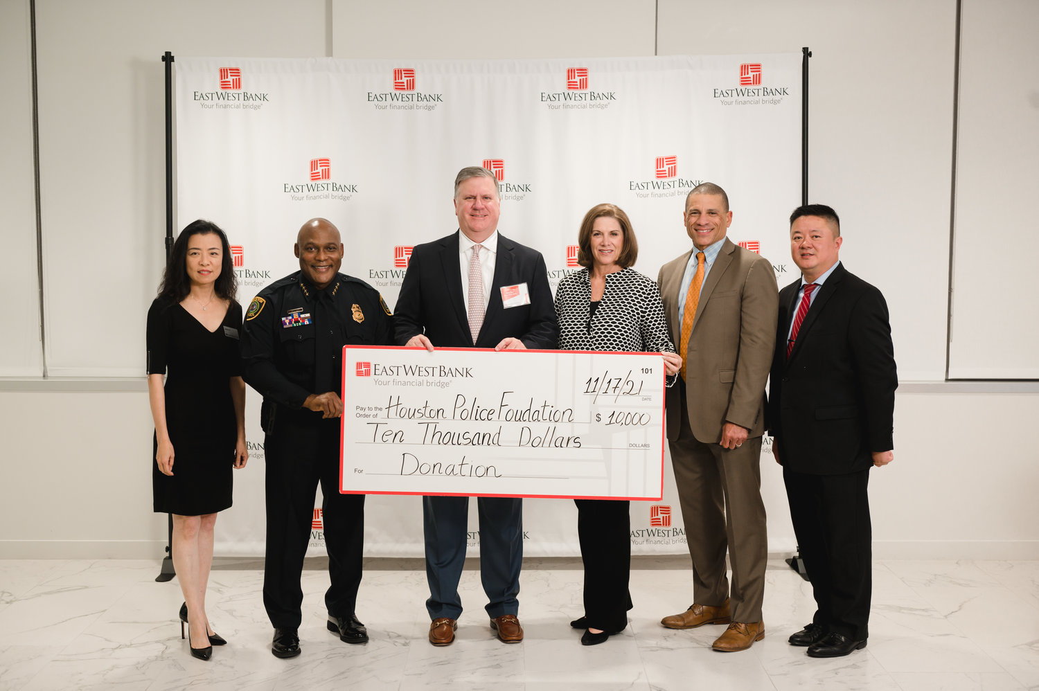 East West Bank representatives presented a $10,000 donation to the Houston Police Foundation on Nov. 18.